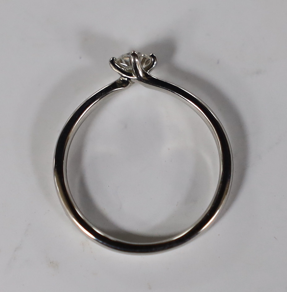 A platinum and solitaire diamond set ring, size O, gross weight 3.5 grams
